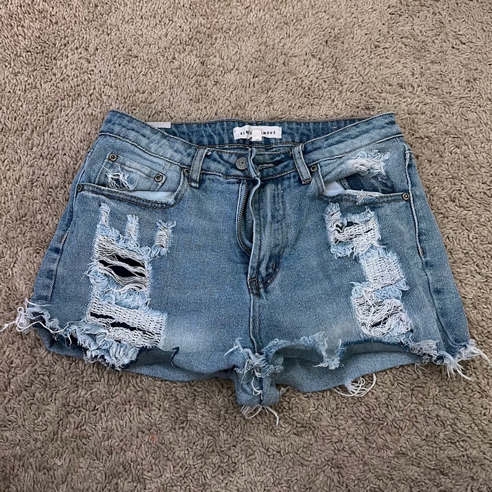 Ripped women’s denim shorts.